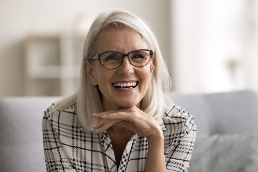 smiling woman with dentures