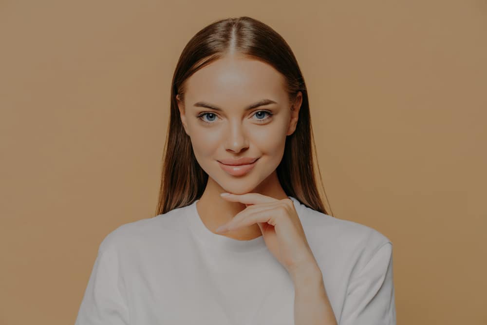 woman smiling from jawline contouring
